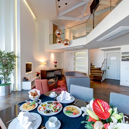 The Elysium Taksim Hotel Istanbul Exterior photo The interior of a suite at the hotel