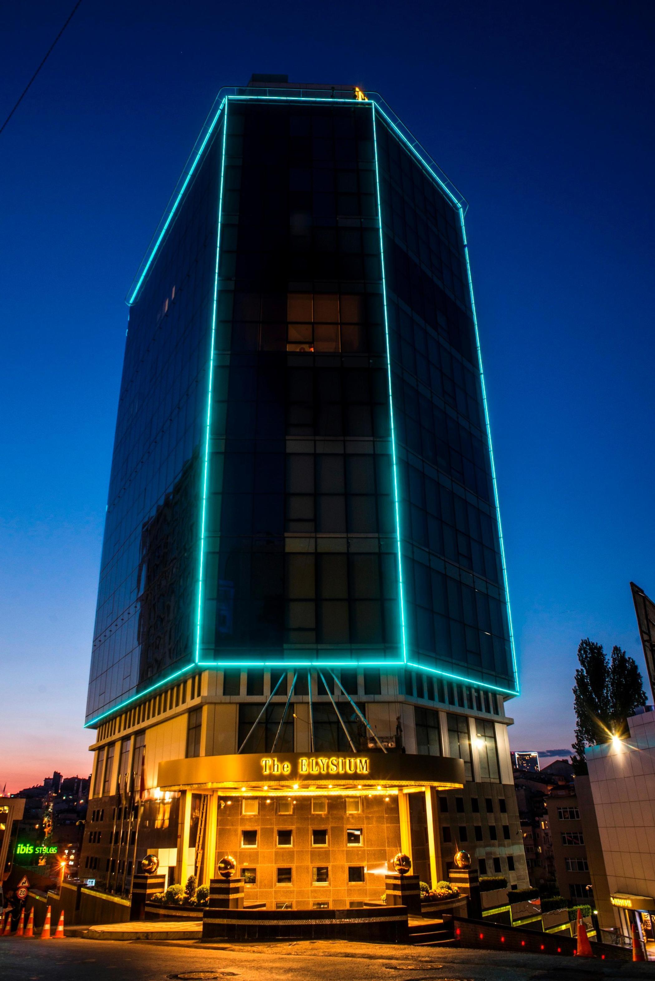 The Elysium Taksim Hotel Istanbul Exterior photo The building at night